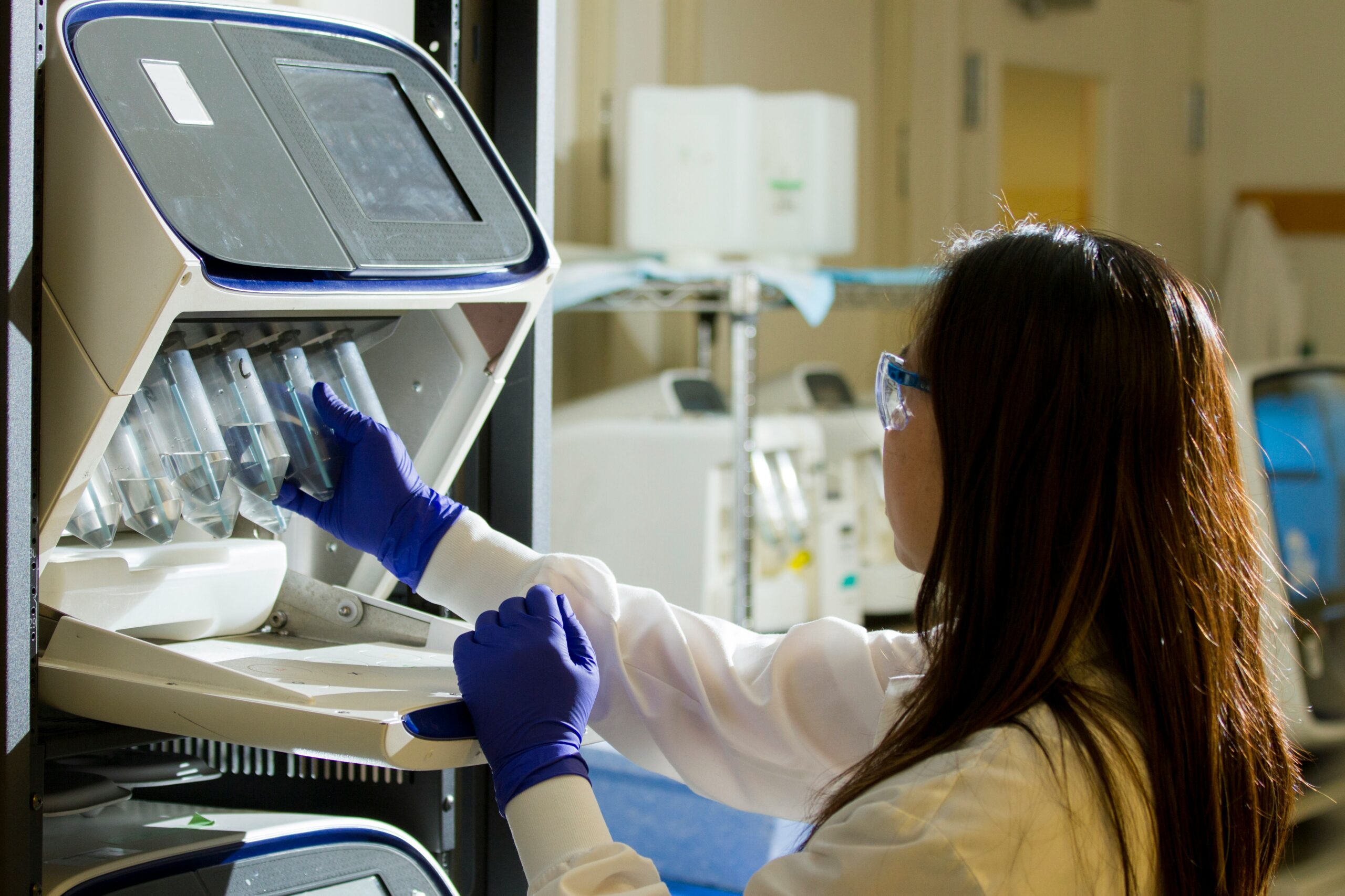 woman doctor working on medical equipment